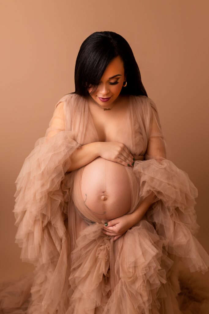 a pregnant mama with a beautiful gown